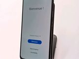 a phone that is sitting on top of a stand