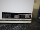 a close up of a bandolin machine on a counter
