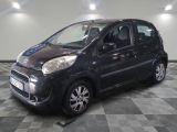 a picture of a small black car on a checkered floor