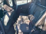 a picture of a car seat with a tray in the back