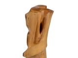 a wooden sculpture of a man with his head in the shape of a tree trunk