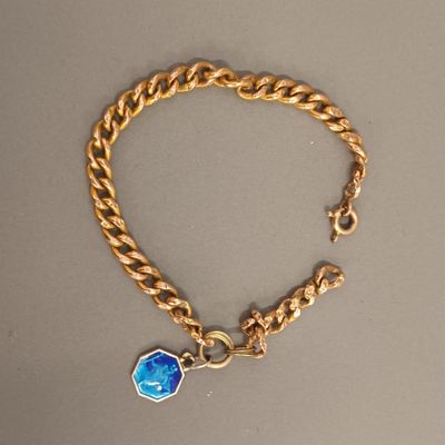 Gourmette creuse en or jaune 18K, retenant un pendentif émai… - Photo 1