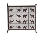 a close up of a metal screen with camels and giraffes on it