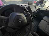 dashboard of a car with a steering wheel and dashboard controls