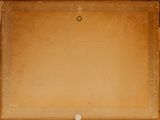 an open suitcase with a ball in it on the floor