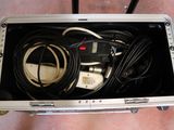 a metal case with a bunch of wires inside of it