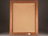 an old picture frame with a piece of paper on it
