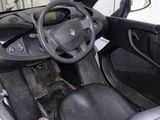 a small car with a steering wheel and a dashboard