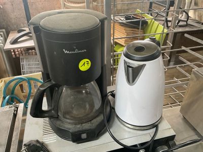 a coffee maker sitting on top of a table