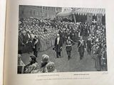 an old picture of a crowd of people in formal attire