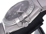 a close up of a watch with diamonds on it