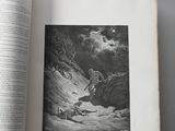 an open book with a picture of a man on a mountain