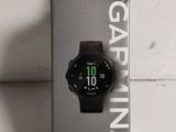 a close up of a box with a watch inside of it