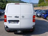 a white van that is parked in a parking lot