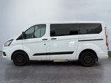 a picture of a white van parked in a parking lot
