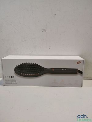 an image of a hair brush sitting on top of a box