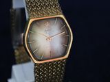 an image of a close up of a wrist watch on a stand