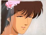 a picture of a young man with a flower in his hair