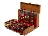 a wooden case with silverware in it on a white background