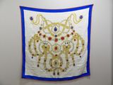 an image of a wall hanging with a blue and white design
