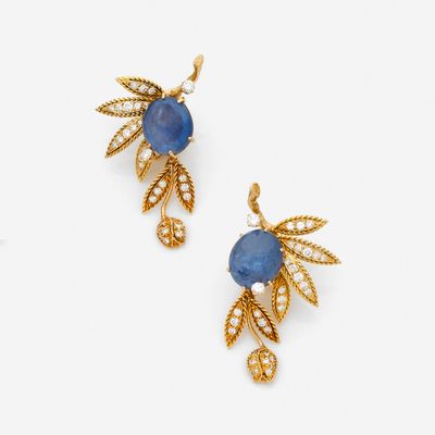 a pair of sapphire and diamond earrings