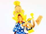 a figurine of a man with a crown on his head