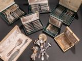 many different types of silverware in a box