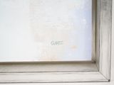 a picture of a cat that is sitting on a window sill