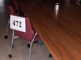 a long table with a number on it in the middle of a room