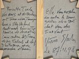 a close up of a picture of a piece of paper with writing on it