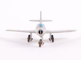 a toy airplane that is sitting on a white surface