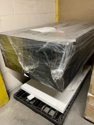 a large box sitting on top of a pallet in a warehouse
