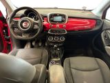 the interior of a small car with a steering wheel and dashboard
