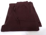 three pieces of brown clothing are folded on top of each other
