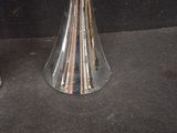 a vase with flowers in it sitting on a table