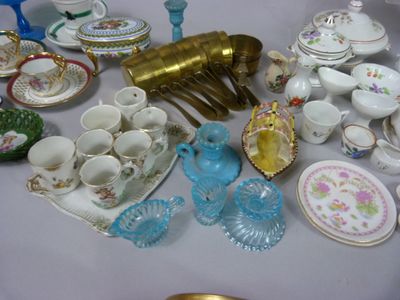a table with a lot of different types of dishes and cups