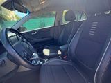 the interior of a car with black leather seats and black trims