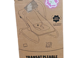 a cardboard box with a picture of a baby in a car seat
