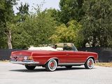 an image of a red convertible car parked in a parking lot