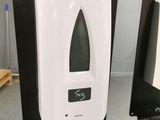an image of a black and white toilet paper dispenser