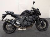 a motorcycle that is parked in a garage