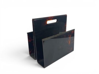 two black plastic bags with handles and handles on a white background