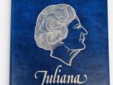 a blue book with a drawing of a woman ' s profile on it