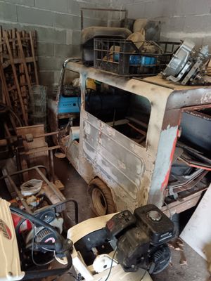 a small truck that is parked in a garage