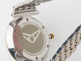 an image of a close up of a wrist watch on a white surface