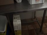 a table with a bunch of boxes on top of it