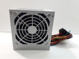 a close up of a computer power supply on a white surface