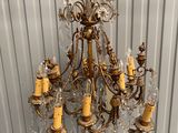 an image of a chandelier hanging from a ceiling in a room