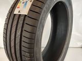 a close up of a tire on a white surface
