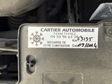 an image of a car engine with a sticker on it